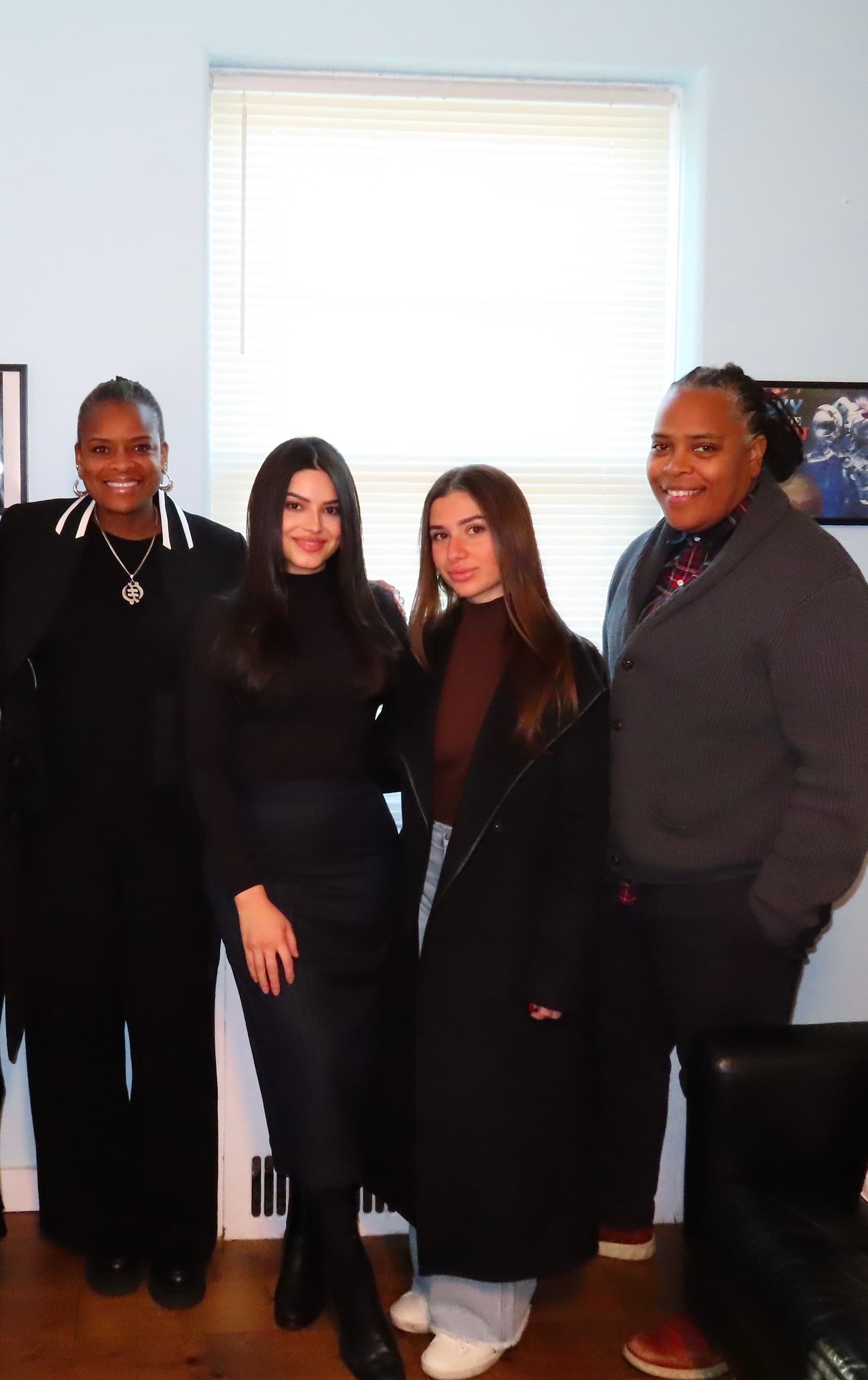 Backpacks filled with school supplies organized for distribution to students